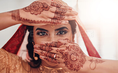 Buy stock photo Bride, portrait and Indian woman with henna for marriage ceremony, vivaha or celebration. Accessories, culture and eyes of person with mehndi hands, sari or bridal jewelry for traditional wedding.