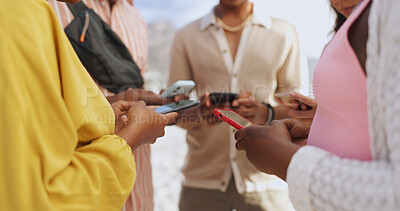 Buy stock photo Phone, hands and friends networking together on social media, mobile app or internet by beach. Travel, technology and group of people with cellphone for notification, communication or connectivity.