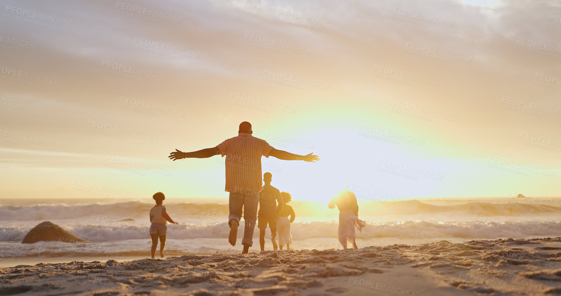 Buy stock photo People, friends and running on beach for freedom, outdoor adventure and group happiness on summer vacation. Carefree, back and youth energy with seaside fun, excited and sunset on holiday for weekend