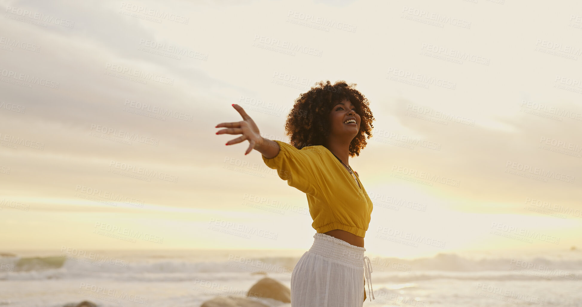 Buy stock photo Sunrise, ocean and happy woman for freedom, vacation and holiday weekend in Miami with smile. Beach, african girl and carefree for adventure, peaceful and joy for sea breeze by scenic view outdoor