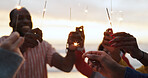 Outdoor, sparkler and group of people with happiness at party, celebration with friends on vacation. Crowd, smile and fireworks on island holiday in Bali for travel, together for festival at sunset