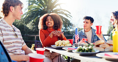 Buy stock photo Conversation, drinks and group of friends outdoor for fourth of July celebration, social event or party. Talking, American flag and young people with alcohol bonding together at barbecue for weekend.