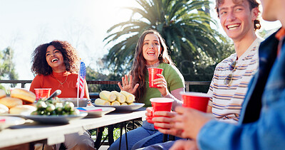 Buy stock photo Conversation, alcohol and group of friends outdoor for fourth of July celebration, social event or party. Talking, American flag and young people bonding together at barbecue on terrace for weekend.