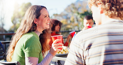 Buy stock photo Friends, woman and laughing with drinks outdoor on terrace with conversation, reunion and social event in summer. People, barbecue and happy on patio with food, talking and celebration with bonding