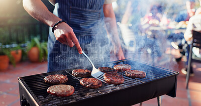 Buy stock photo Barbecue, cooking and man with burgers outdoor backyard for meal at reunion, social event or lunch on terrace. Party, food and male person grilling patty, beef or meat for bbq dish on weekend at home