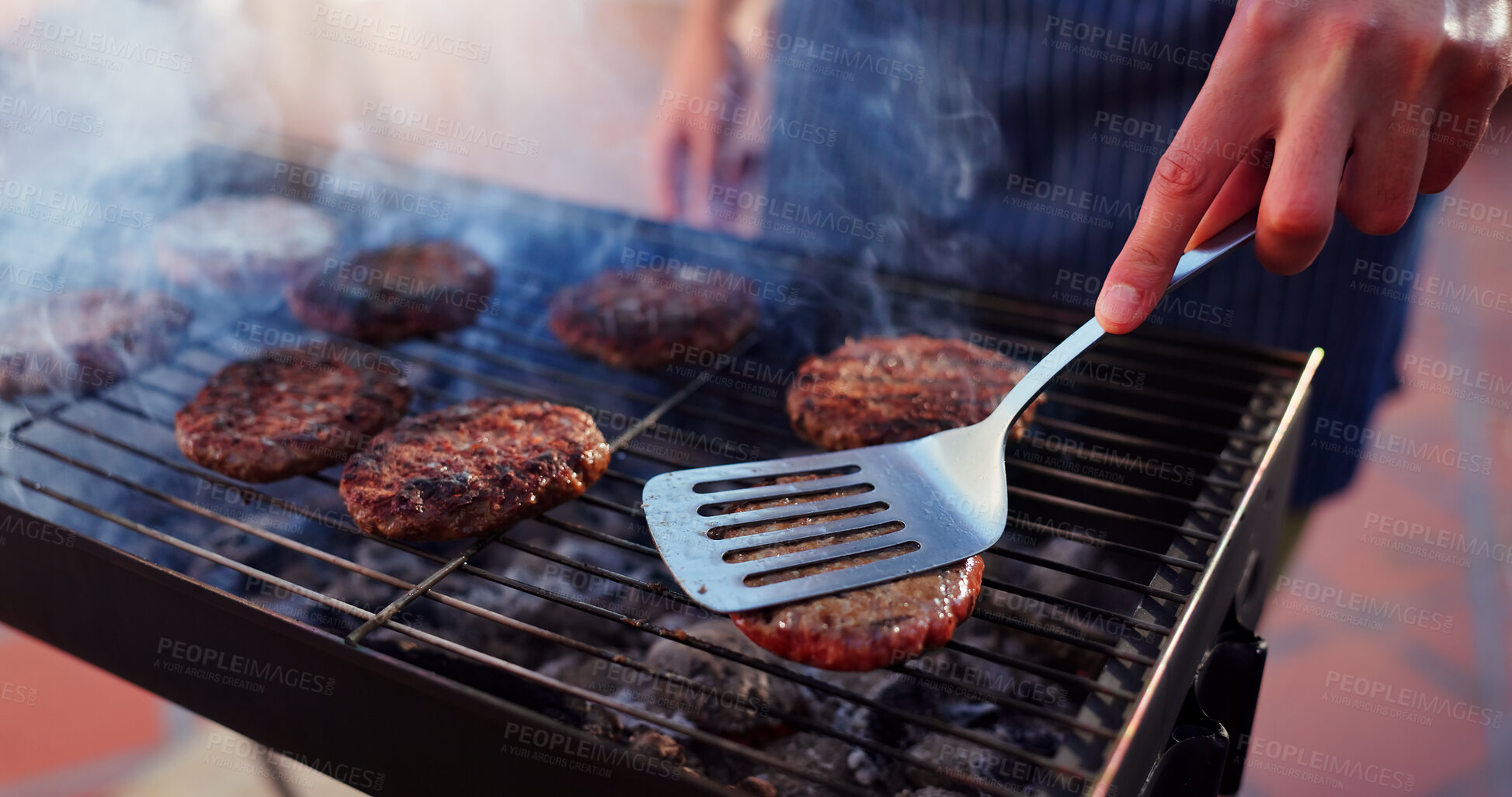 Buy stock photo Grill, party and man with burgers outdoor backyard for meal at reunion, social event or lunch on terrace. Barbecue, food and male person cooking patty, beef or meat for bbq dish on weekend at home.