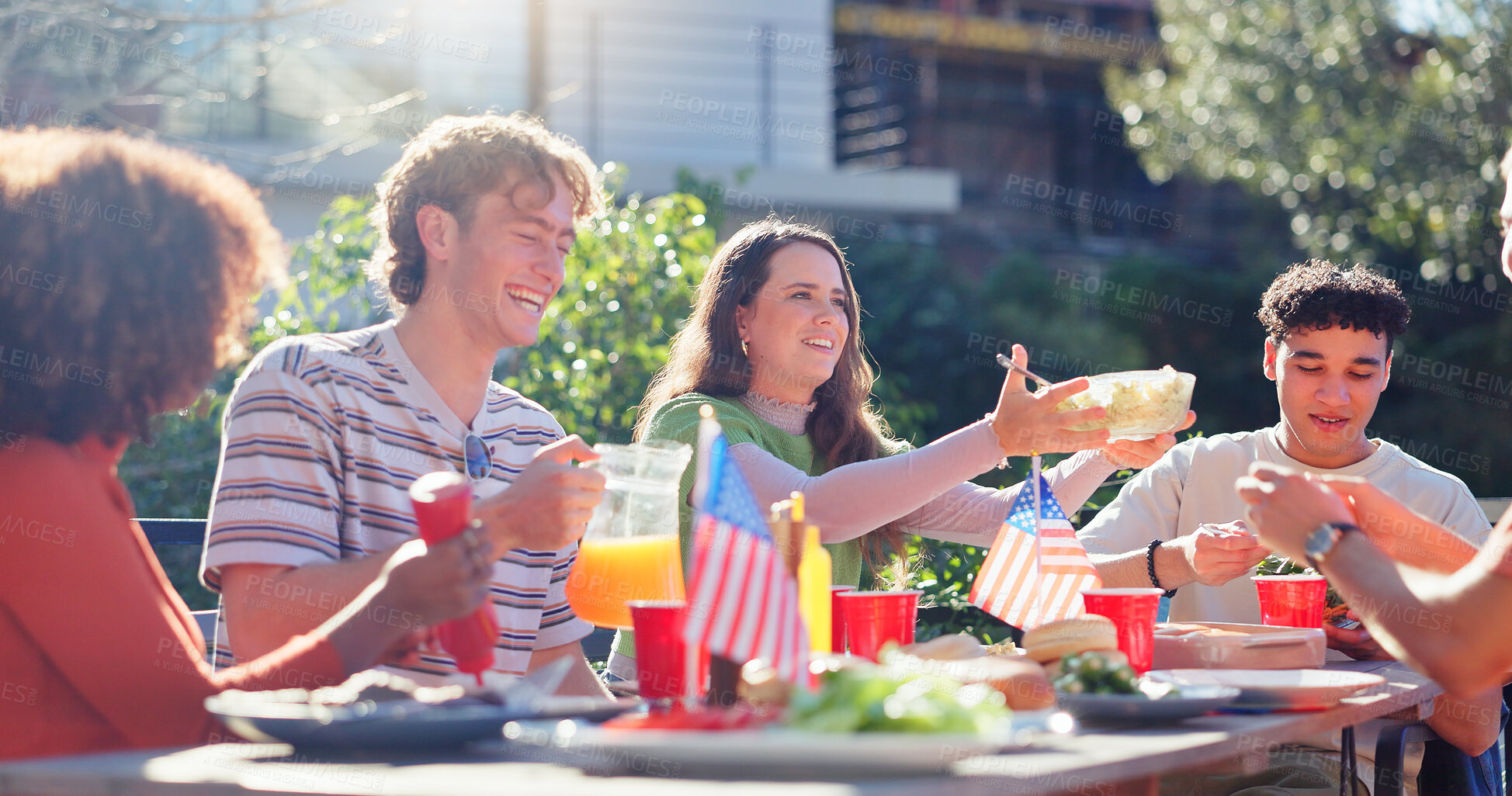 Buy stock photo Friends, group and eating bbq in garden on terrace with conversation, holiday or social event in summer. People, barbecue and reunion on patio with food, talking or celebration with bonding or drinks