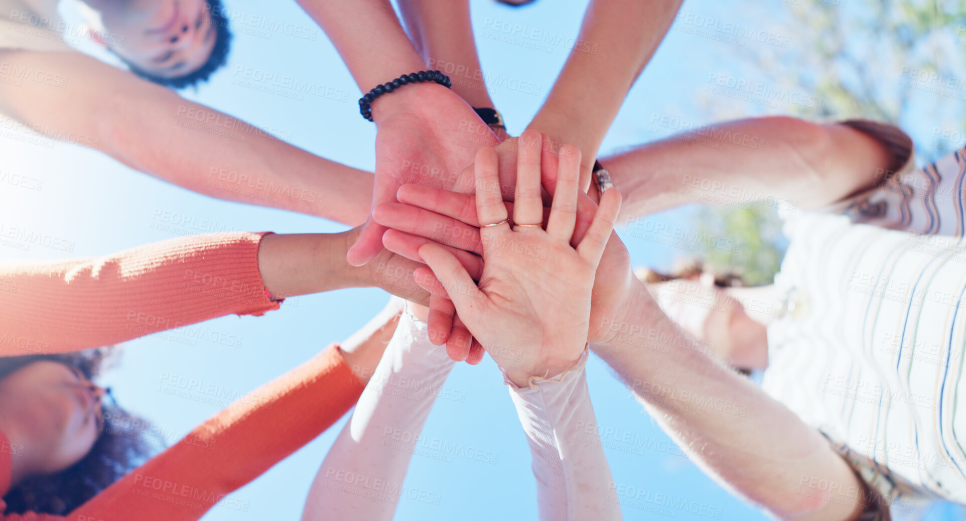 Buy stock photo Friends, people and hands together with low angle outdoor for teamwork, unity and support in nature. Group, team building and solidarity for collaboration, partnership and motivation with diversity