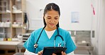 Happy woman, vet and research with tablet for animal medicine, study or browsing at clinic. Young asian, female person or veterinarian scrolling on technology for medical search or pet treatment