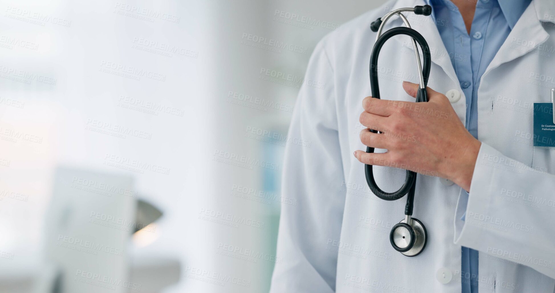 Buy stock photo Hand, doctor and person with healthcare, stethoscope and medical with white coat, career ambition and wellness in hospital. Closeup, clinic and physician with equipment, support and cardiology