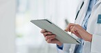 Person, doctor and hands with tablet for medical research, discovery or study at hospital. Closeup of healthcare employee scrolling on technology for telehealth, medicare or online browsing at clinic