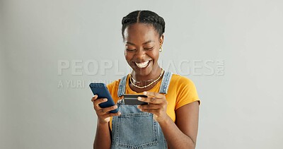 Buy stock photo African woman, credit card and phone in studio with smile for deal, discount and fintech by white background. Girl, smartphone and banking with online shopping, e commerce and sale on mobile app