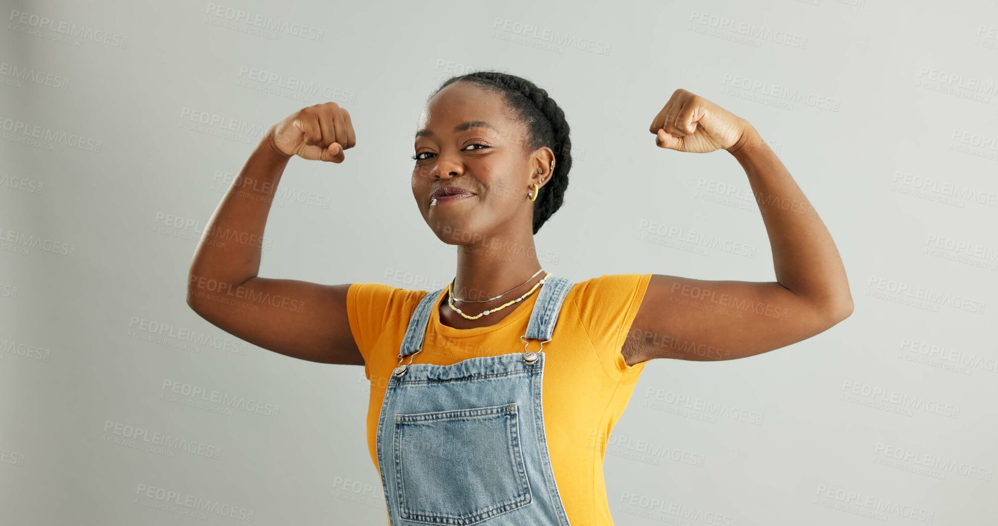 Buy stock photo Happy, portrait and black woman flex in studio for achievement, satisfaction or celebration on gray background. Strength, victory and excited person for accomplishment, champion or winner with mockup