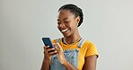 African woman, phone and texting in studio with smile, reading or thinking for contact by white background. Gen z person, girl and happy with smartphone for chat, meme or social network on mobile app
