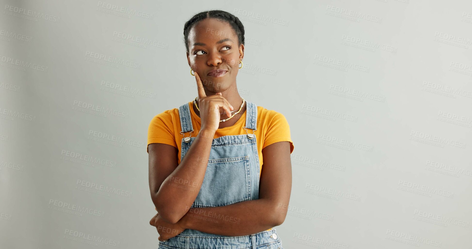 Buy stock photo Black woman, studio and thinking of ideas for problem solving or planning, insight and brainstorming for decision. Girl, thoughtful and isolated on white background with mockup, pensive and choice.