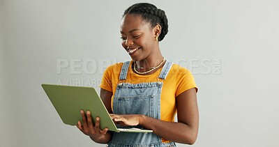 Buy stock photo Black woman, studio and happy with laptop for online or internet research and networking on white background. Female person, isolated and smile for browsing website or social media and entertainment