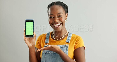 Buy stock photo Woman, smartphone and green screen or happy in studio, student and online course with mobile application on web. Tech, connection and communication or education ads, info and scholarship announcement