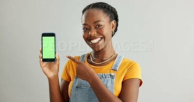 Buy stock photo Woman, smartphone and green screen or smile in studio, student and online course with mobile application on web. Tech, connection and communication or education ads, info and scholarship announcement