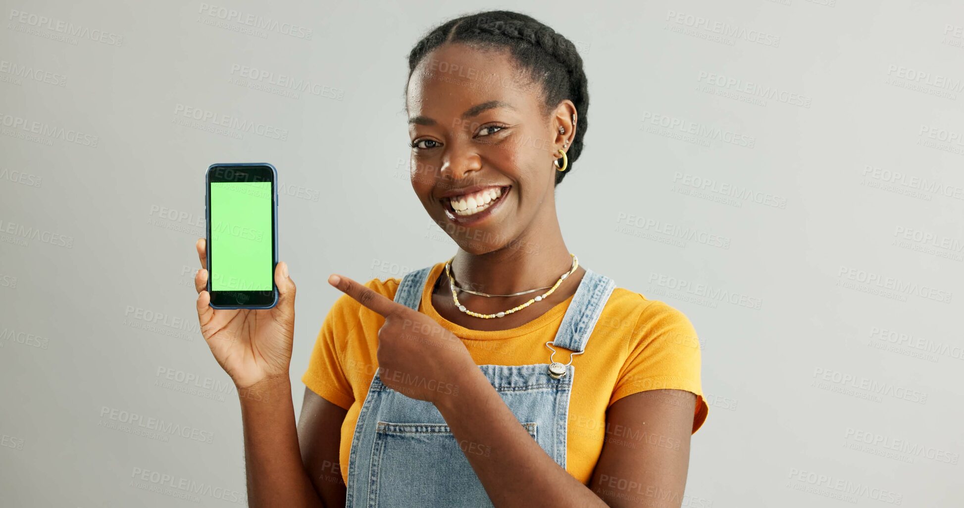 Buy stock photo Woman, smartphone and green screen or smile in studio, student and online course with mobile application on web. Tech, connection and communication or education ads, info and scholarship announcement