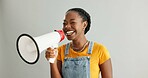 African woman, megaphone and happy in studio for deal, news or promotion with voice by white background. Person, bullhorn and speech with smile for info, sale or retail discount with audio technology
