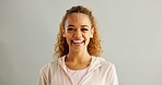 Woman, portrait and happy in studio background with sportswear and proud for progress. Female person, confident and smile or laugh with satisfaction for fitness, exercise and workout results