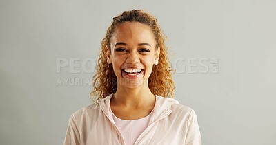 Buy stock photo Woman, portrait and happy in studio background with sportswear and proud for progress. Female person, confident and smile or laugh with satisfaction for fitness, exercise and workout results