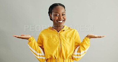 Buy stock photo Portrait, options and black woman with open hands, choice and decision on grey studio background. African person, face and model with hand gesture, comparison and opportunity with advice and feedback