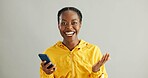 Woman, happy and smile with smartphone in studio, mobile notification and retail promotion on background. Connection, communication and website or social media announcement, surprised and ecommerce