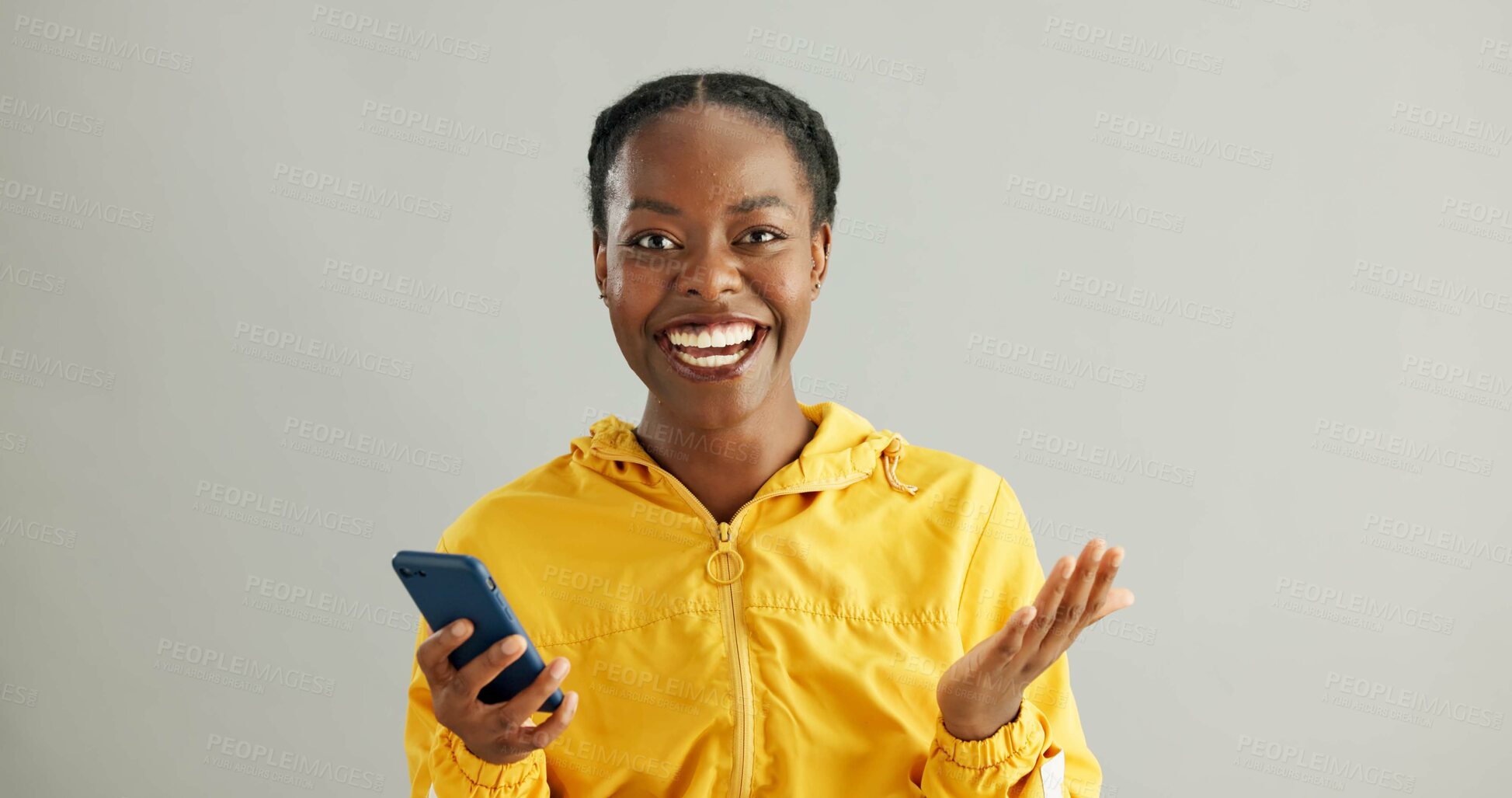 Buy stock photo Woman, happy and smile with smartphone in studio, mobile notification and retail promotion on background. Connection, communication and website or social media announcement, surprised and ecommerce