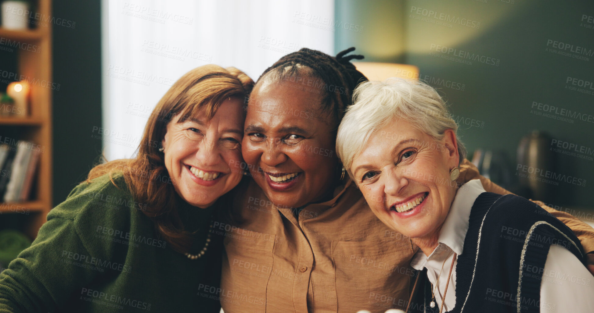 Buy stock photo Hug, portrait and happy as senior women in house with care, trust and support, relax and bonding with coffee. Smile, face or elderly friends embrace in retirement home for reunion, visit or tea party