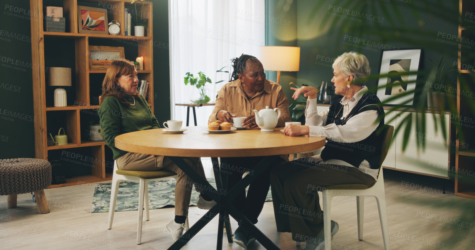 Buy stock photo Elderly, women and retirement with eating in home with conversation, bonding or wellness with tea party. Senior, people and friends in hospice with talking for relax, support or happy at dinner table