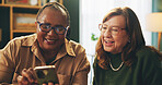 Happy, glasses and senior women with phone in house for learning, help or teaching social media, how to or sign up. Smartphone, advice and elderly friends online for streaming subscription search