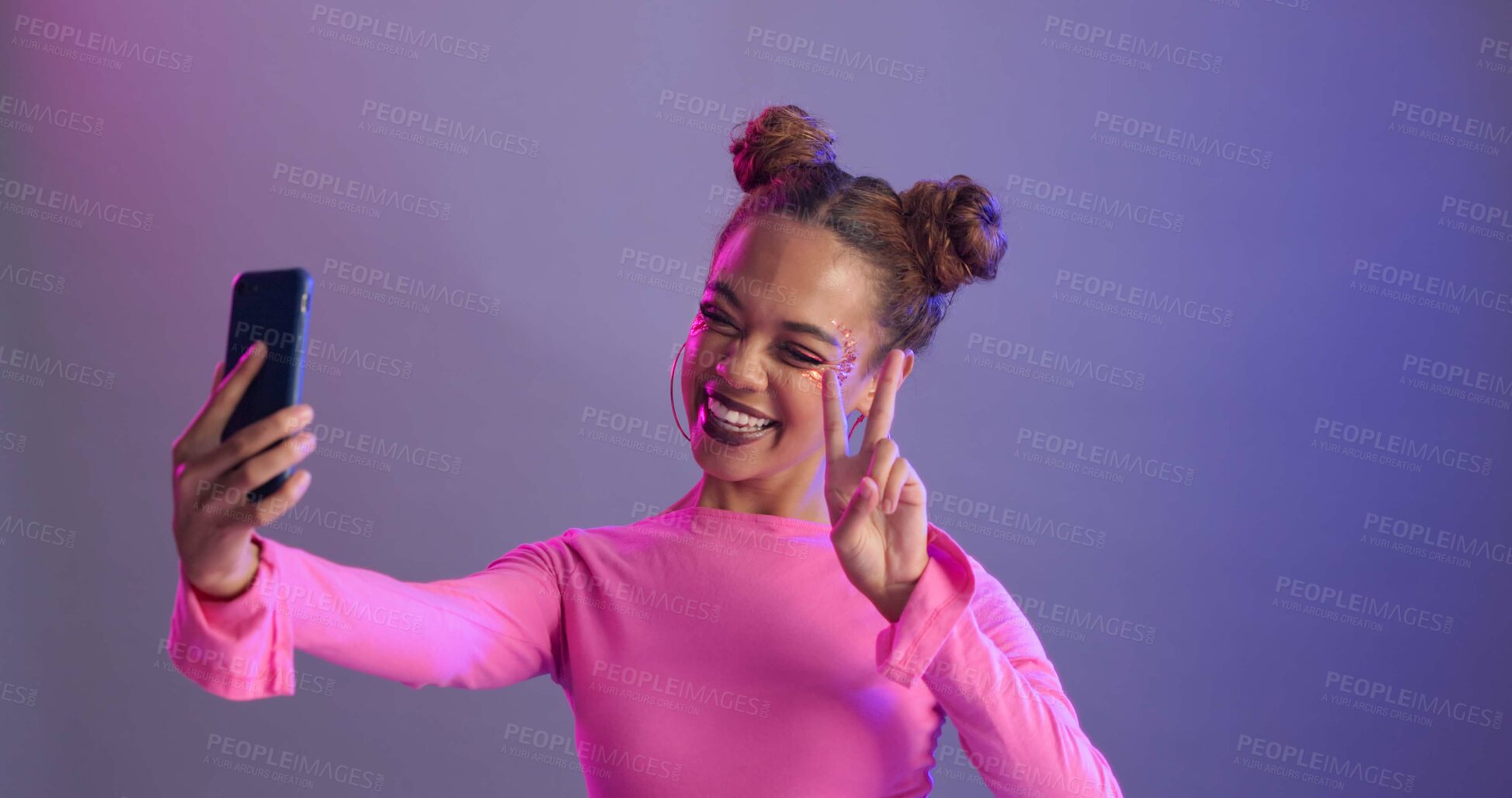 Buy stock photo Woman, selfie and peace sign in studio with smile, fashion and makeup for post by purple background. Influencer, girl and happy for audience growth with icon, emoji or profile picture on social media