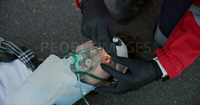 Buy stock photo First aid, paramedic and check man with flashlight for emergency ems service, accident and oxygen mask. Hands, medical or light on unconscious patient eyes for healthcare,  help or rescue in top view