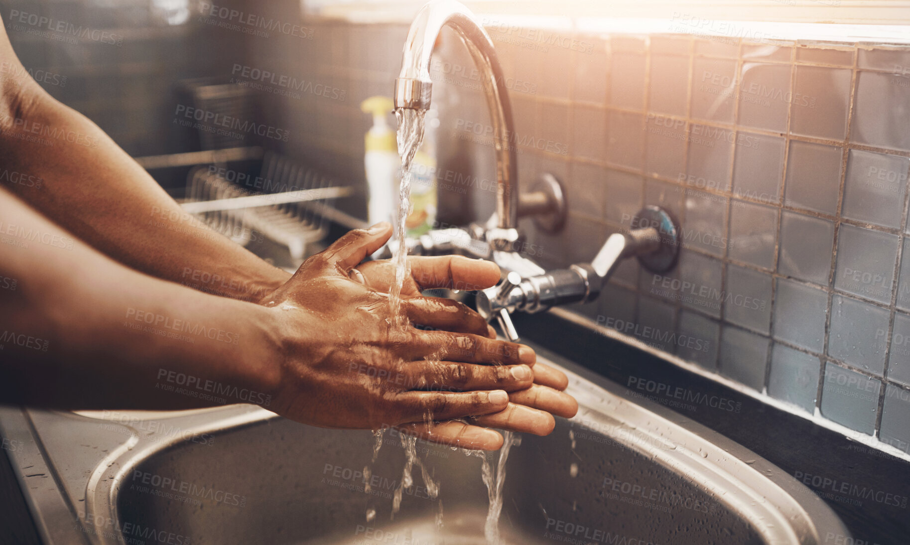 Buy stock photo Kitchen, washing hands and water with person at sink in home for cleaning or hygiene closeup. Health, splash and wellness with liquid from faucet or tap in apartment to remove bacteria and germs 