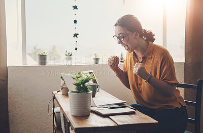 Buy stock photo Woman, laptop and celebrate win in home office, online success and prize giveaway or bonus. Female person, excited and fist pump for victory, lottery and promotion deal or wow for reward on website