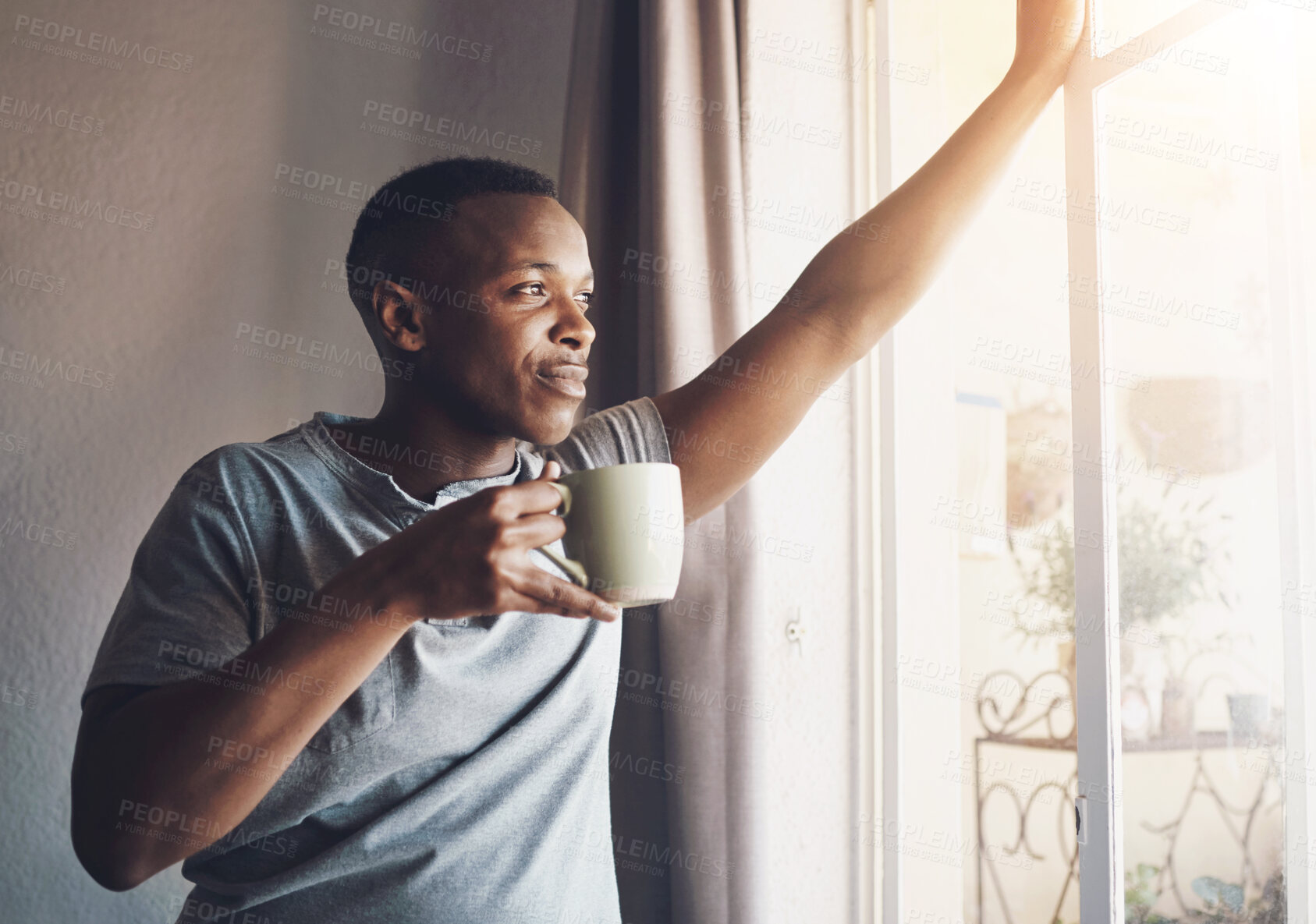 Buy stock photo Black man, coffee and thinking by window in home for morning routine, checking weather or daydreaming. Person, smile or thoughtful with caffeine for reflection, nostalgia or happy memory to start day