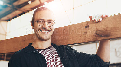 Buy stock photo Small business, woodwork and man with smile, portrait and construction with equipment. Face, employee and carpenter with glasses, happiness and project with skills, natural material and warehouse