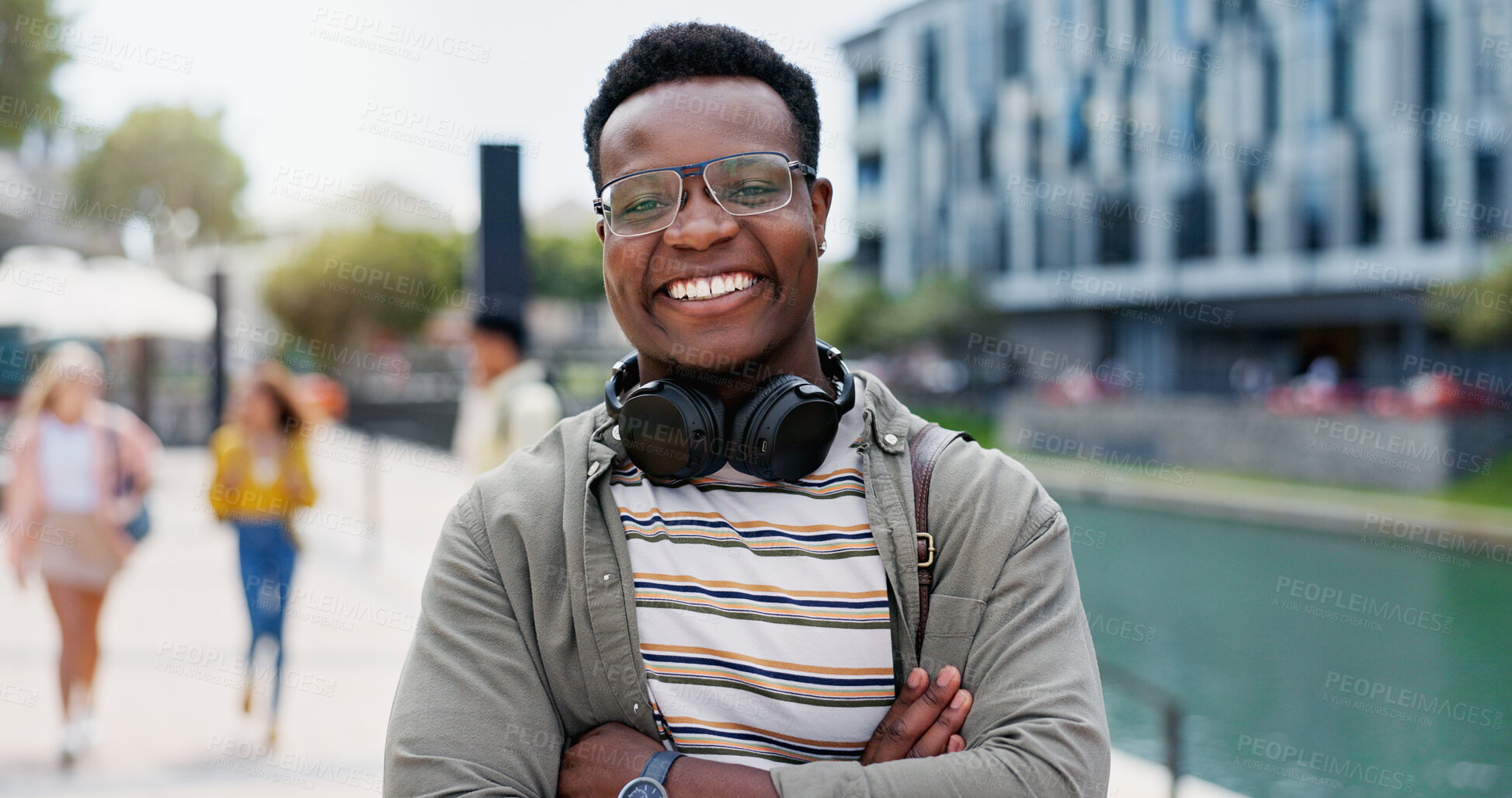 Buy stock photo Smile, crossed arms and portrait of black man in city with confidence for travel or exploring on holiday. Happy, pride and African male person on weekend trip for downtown sightseeing in Kenya.