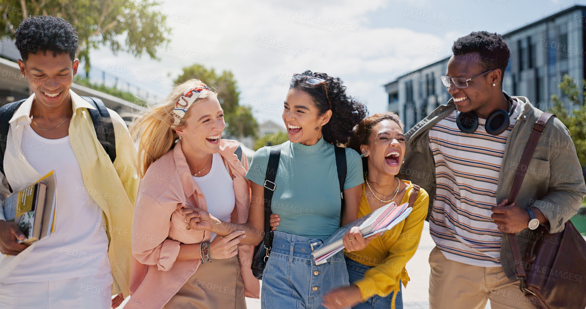 Buy stock photo Walking, laughing and students at university with fun for learning, bonding and talking. People, diversity and group of gen z friends outdoor with books ready for education at college campus.