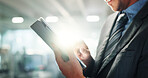 Hands, tablet and business person in office for connection, information or research with flare. App, social media and tech with professional employee in corporate workplace for email communication