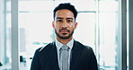 Portrait, business and Asian man in office for corporate career, job or employee work at company. Face, professional or confident financial broker, entrepreneur or male person in suit in Singapore