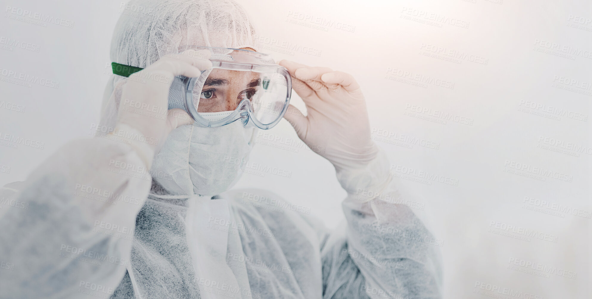 Buy stock photo Person, safety and glasses for disaster control with suit, decontamination and procedure. Fog, man and thinking outdoors with PPE, pandemic management and gear for disinfection for prevention