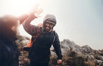 Buy stock photo Mountain, high five and men hiking together for outdoor adventure, happy achievement and morning bonding. Fitness space, support and friends trekking in nature with smile, motivation and teamwork