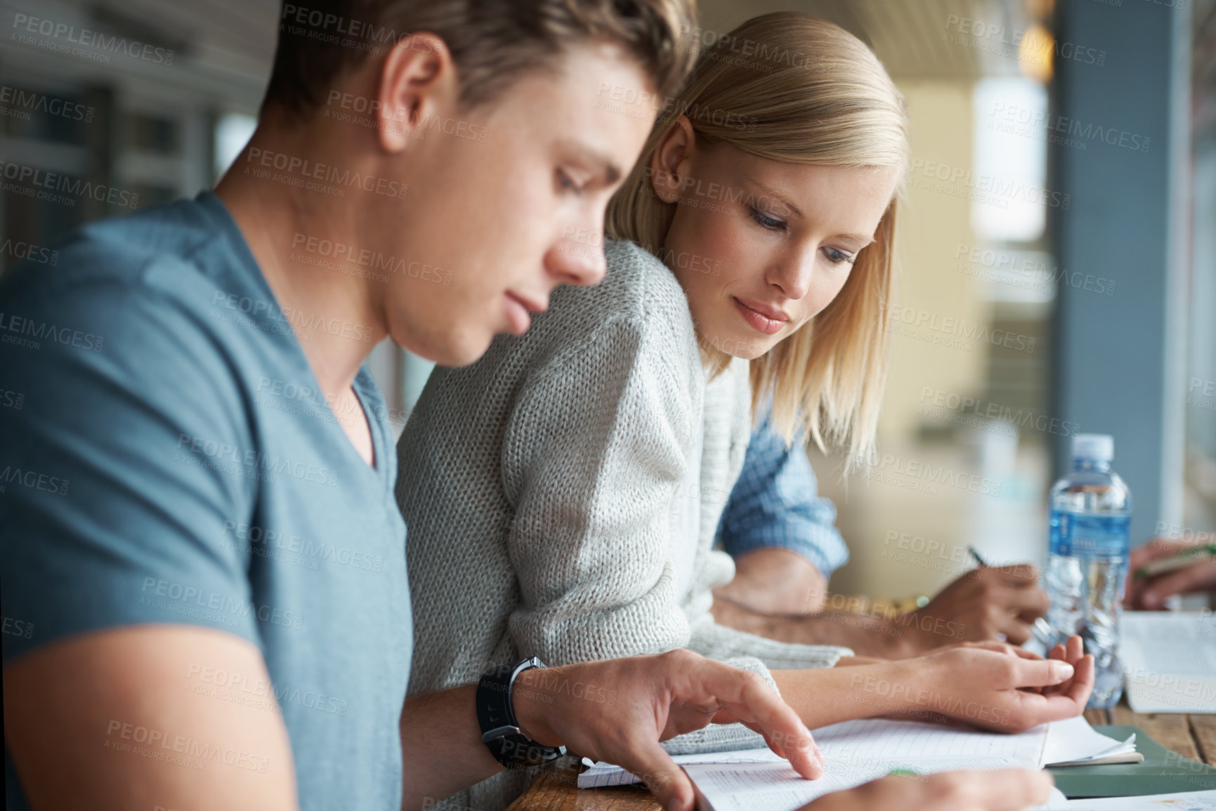 Buy stock photo Students, university and education, study together with books for research project on campus. Discussion, learning and knowledge for academic growth with man and woman for teamwork at college