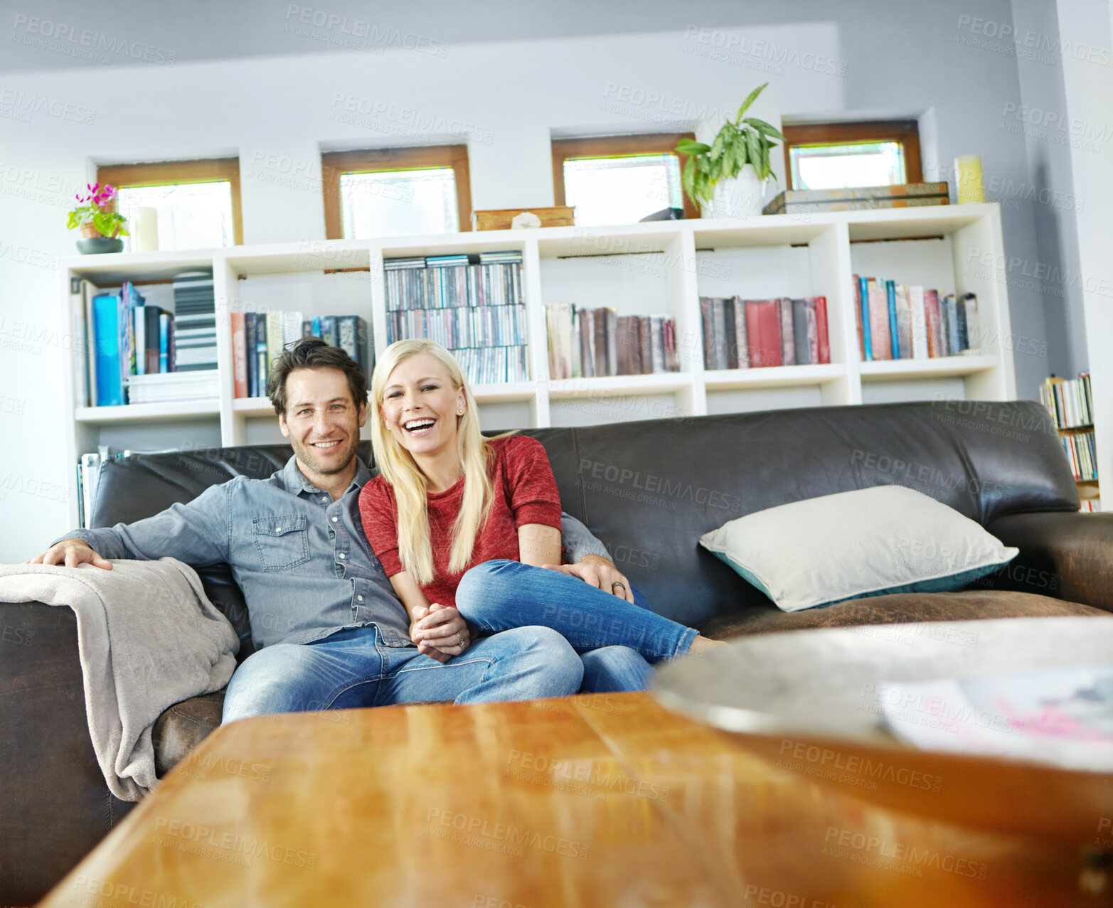 Buy stock photo Portrait, woman and man with hug in home for weekend as couple with happiness, relationship on couch. Married people, comfortable and cheerful in bonding for break, together or peace for love