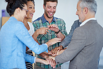 Buy stock photo Celebration, business people and hand stack in office for success, team building and pride. Meeting, partnership and ceo or man with employees for project, achievement and diversity in workplace