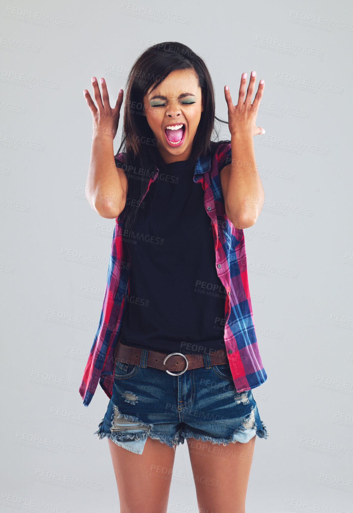 Buy stock photo Anger, scream and young woman for fashion, clothes and trendy outfit isolated on gray background, Gen z girl, face and confidence for outfit, y2k and cool streetwear for youth on studio backdrop