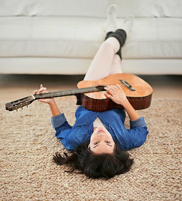 Buy stock photo Relax, guitar and woman on floor, portrait and peace in living room, break and creativity for music in house. Lounge, calm and rest on ground, home and song writer streaming, sofa and instrument