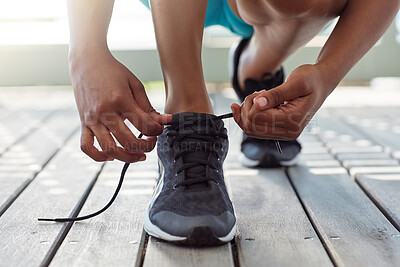 Buy stock photo Runner, legs and tying laces on deck, outdoors and prepare for cardio and marathon training. Person, backyard and shoes for exercise or sports fitness, getting ready and feet for workout or athlete